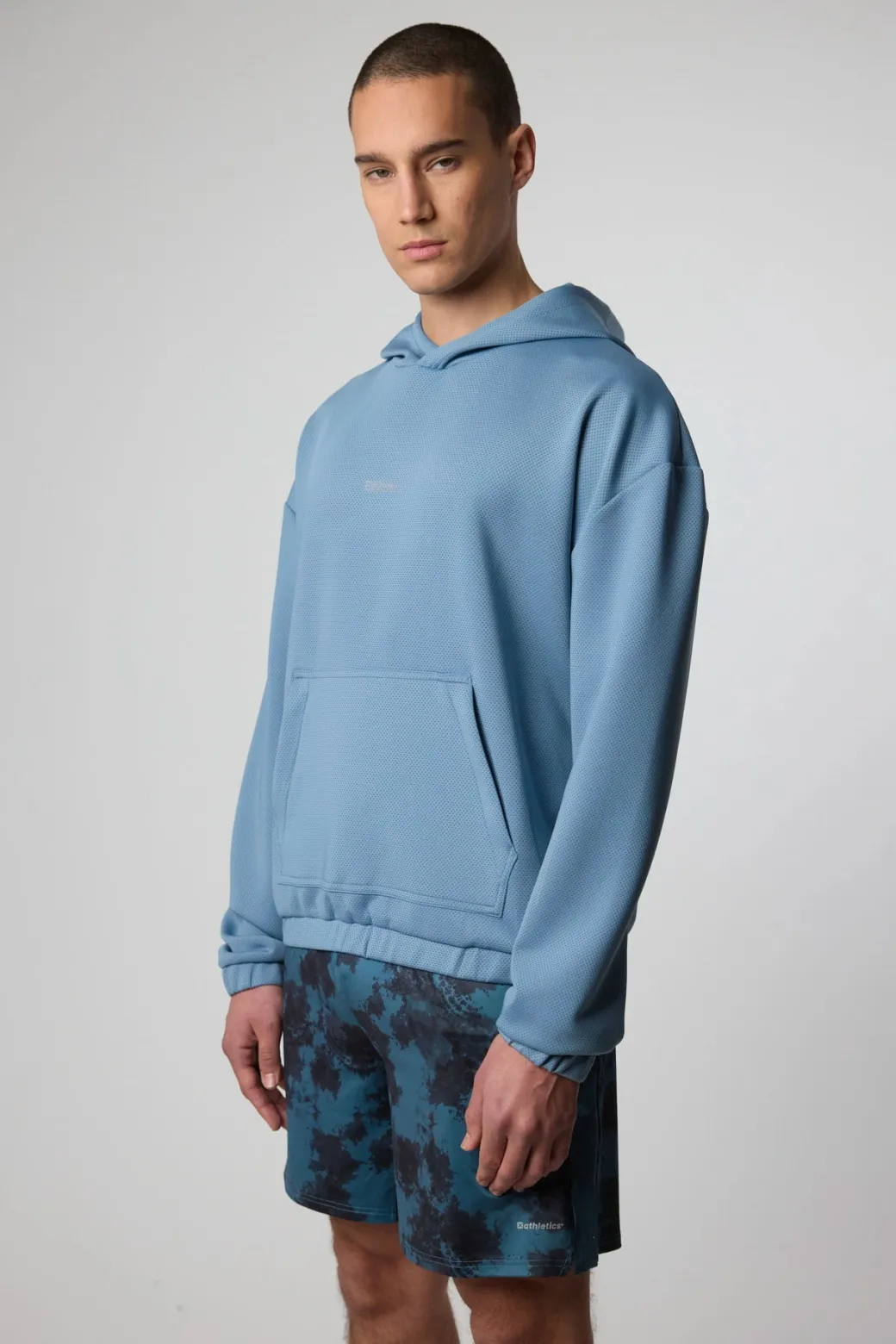 SUDADERA CON CAPUCHA TECH LIGHT BLUE