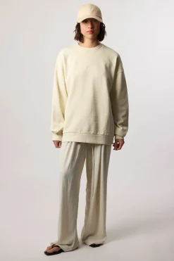 SUDADERA REEF CREMA